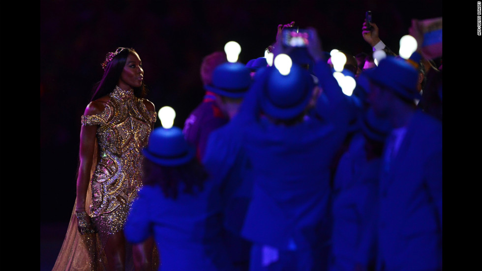 British model Naomi Campbell, left, performs during the fashion segment of the ceremony.