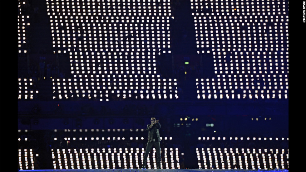 British artist George Michael performs at the Olympic stadium.