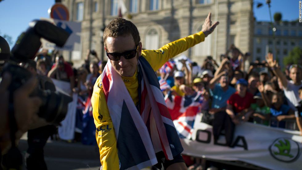 Wiggins lapped up the acclaim on the Champs-Elysees after his landmark victory was confirmed. Thousands of British fans made the trip to Paris to toast his achievement.