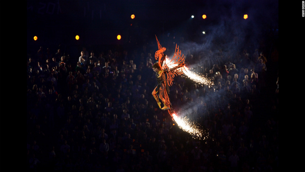 Ballet dancer Darcey Bussell descends into the stadium on a phoenix.