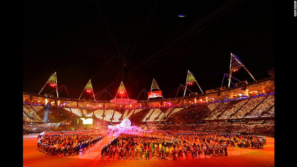 The athletes of the competing nations enter the stadium.