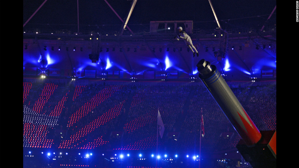 Chachi Valencia, alias The Rocket Man, is propelled in the air at the Olympic stadium.