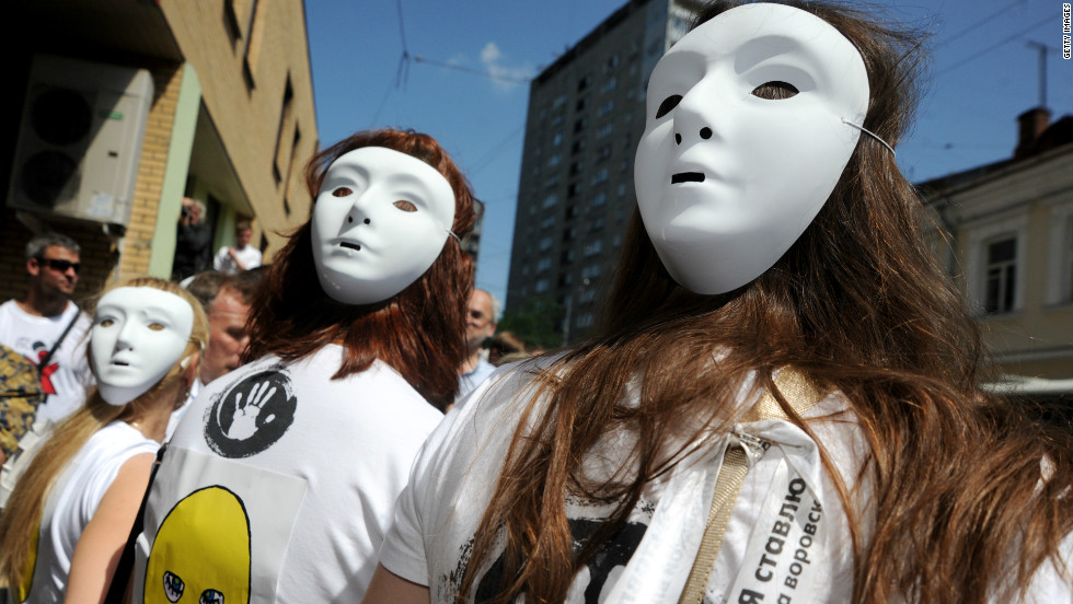 Demonstrators wear Pussy Riot-style masks outside a Moscow court. Singer Madonna also donned one of the masks during a recent gig in the city, telling the audience: &quot;Everyone has the right to free speech, everywhere in the world. Maria, Katya, Nadia, I pray for you.&quot;
