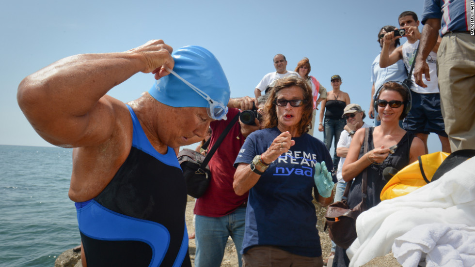 Nyad, left, prepares for her departure. Nyad&#39;s first attempt to cross the Straits of Florida was in 1978, when rough seas left her battered, delirious and less than halfway to her goal.