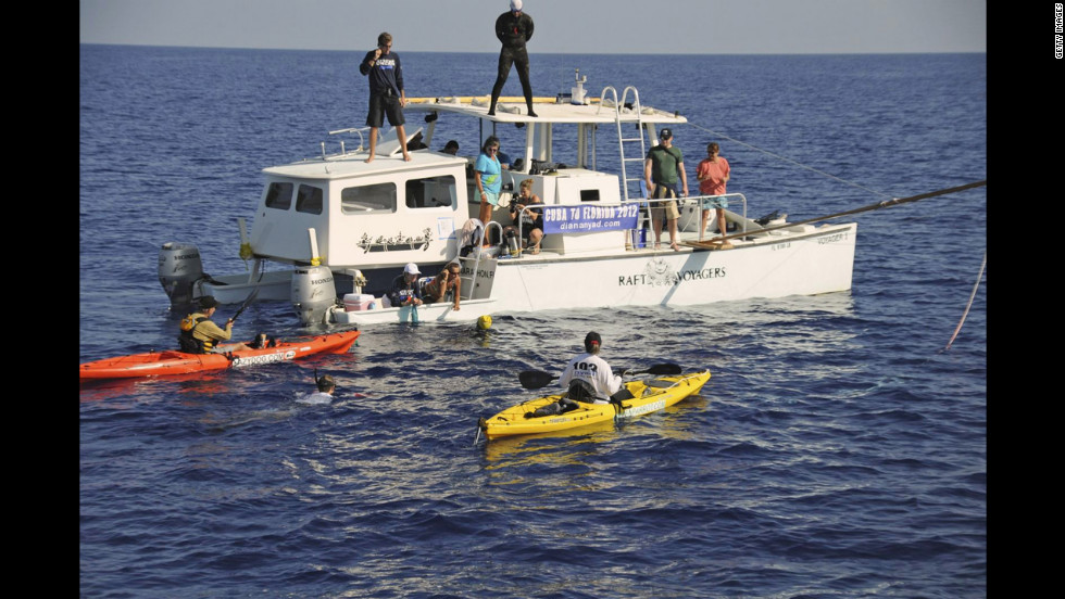 Endurance swimmer Nyad pauses for a rest and hydration with her support crew in the Florida Straits between Cuba and the Florida Keys on Sunday, August 19. 