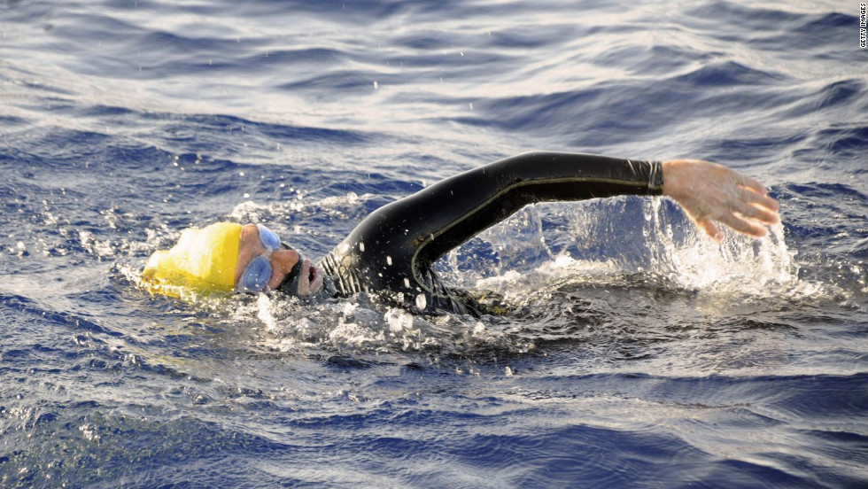 Nyad braves the water without a shark cage, relying on electronic shark repellent and a team of divers to keep them away.