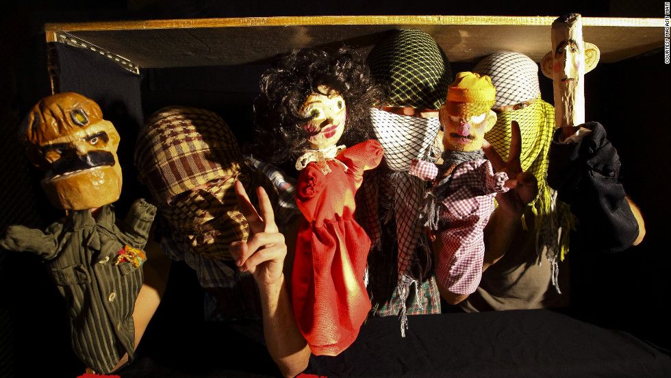 The puppet cast of &quot;Top Goon: Diaries of a Little Dictator,&quot; produced by anonymous Syrian artists&#39; collective Masasit Mati. At the far right is the character representing Assad, known by the diminutive &quot;Beeshu.&quot;