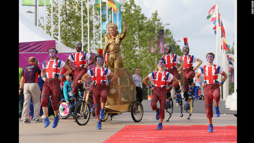 Dancers perform during a welcome ceremony at the Paralympic Village.