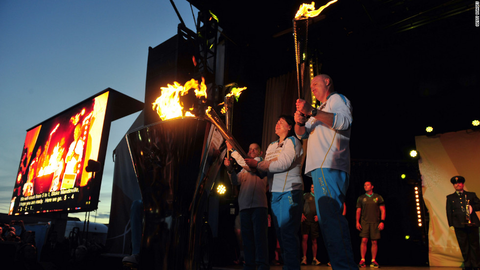 The cauldron is lit as the four Paralympic flames, which were lit on the UK&#39;s highest peaks, are united at Stoke Mandeville Hospital during the torch relay on Tuesday, August 28, in Aylesbury, England.