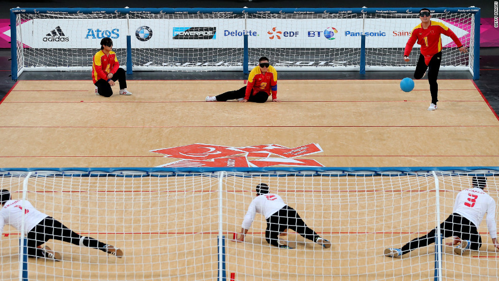 China, top, and Iran compete in the men&#39;s group B goalball match Thursday.