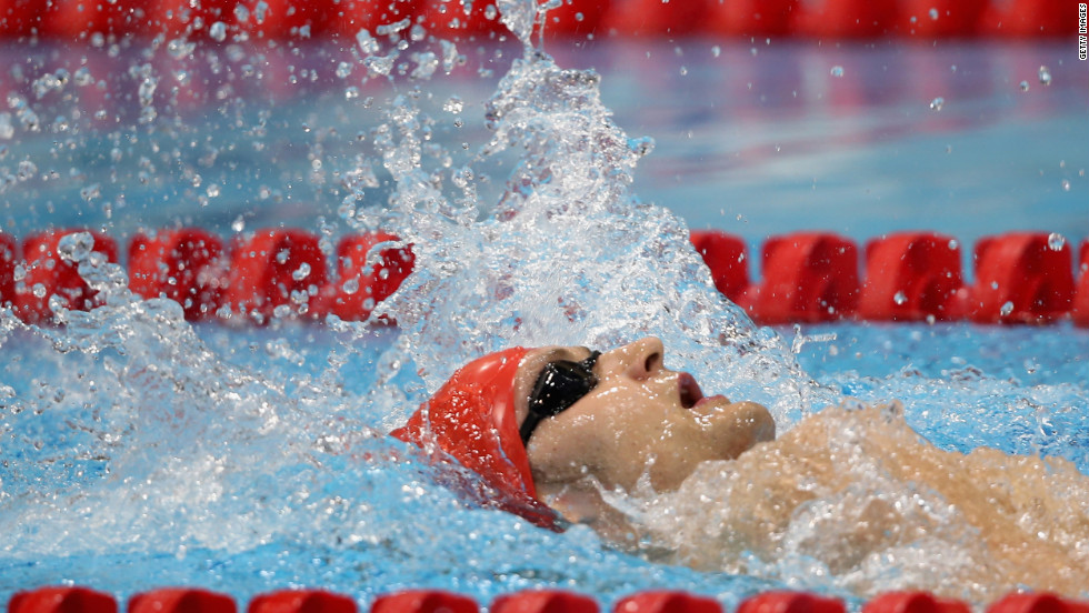 James Crisp of Great Britain swims in the men&#39;s 100-meter backstroke.