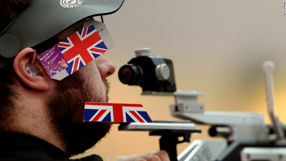Great Britain&#39;s Ryan Cockbill lines up his shot at the shooting range during the P2-10-meter air pistol SH1 final.