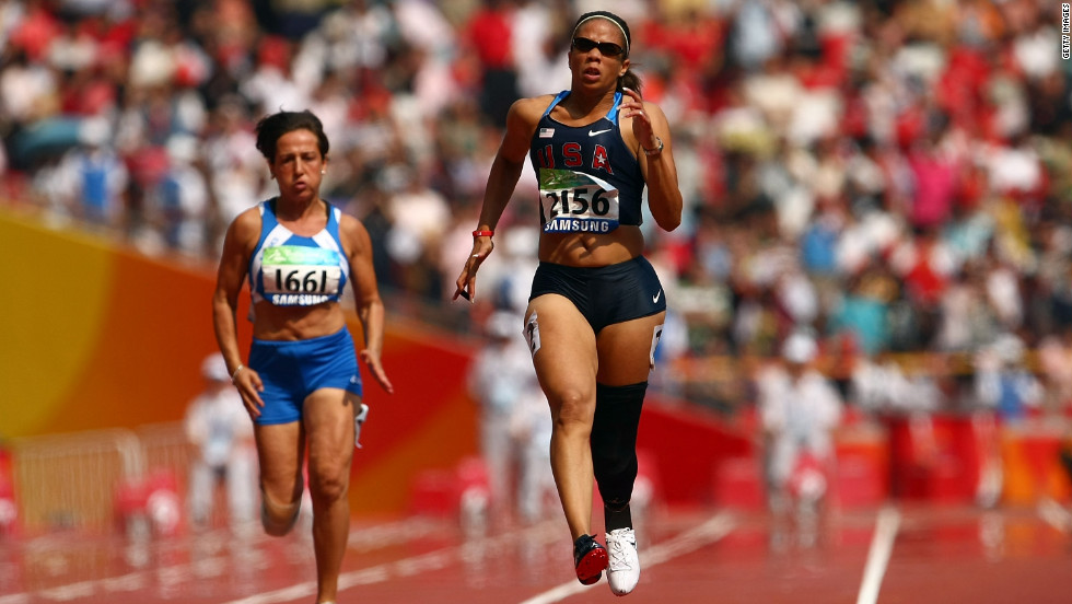 U.S. athlete April Holmes competes in the women&#39;s 100m T44 event on day eight of the 2008 Paralympic Games. She beat her own world record, fulfilling an ambition she&#39;d spoken about before the games. 
