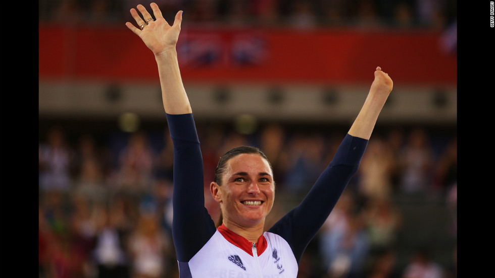 Gold medalist Sarah Storey of Great Britain poses on the podium during the victory ceremony for  women&#39;s cycling.