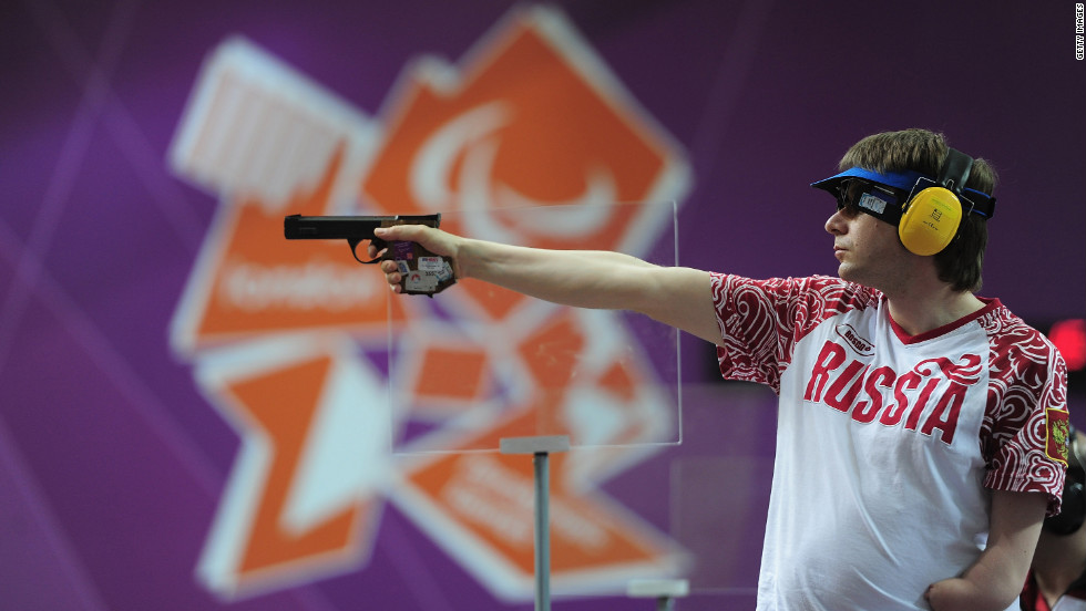 Russia&#39;s Sergey Malyshev shoots during the mixed 25-meter pistol final on Monday.
