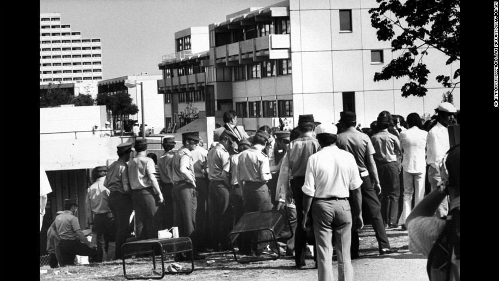 With terrorists holed up in the Israeli athletes&#39; quarters, swarms of German policemen, in uniform and plain clothes, move in and seal off the area, Munich, September 1972.