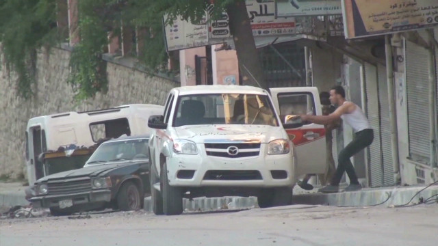 Rebels battle for 100 feet in Aleppo