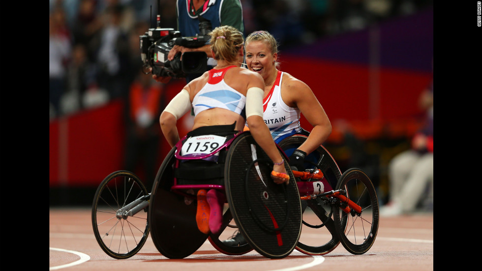 Gold medalist Hannah Cockroft of Great Britain is congratulated by Melissa Nicholls of Great Britain on Thursday.