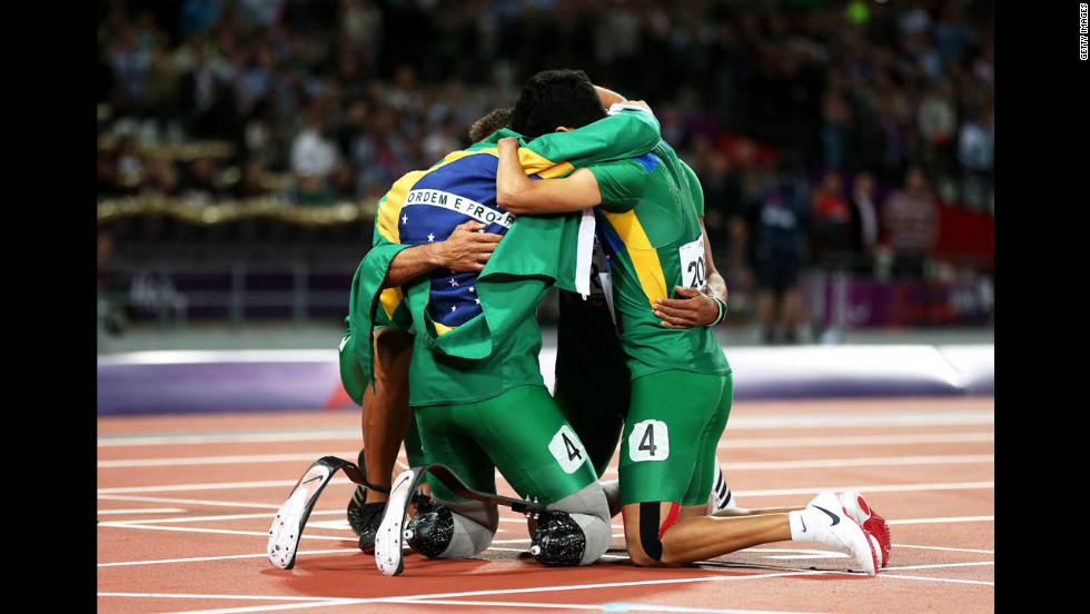Members of the Brazilian team huddle after the men&#39;s 4x100-meter relay T42/T46 final on Thursday. 