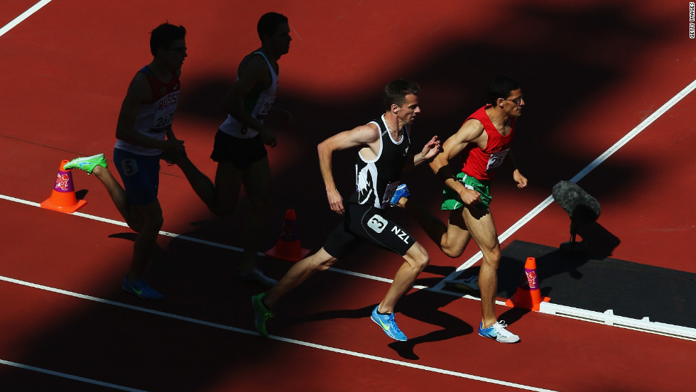 New Zealand&#39;s Tim Prendergast, No. 3, competes in the 800-meter T13 round 1 heat 1 on Friday.