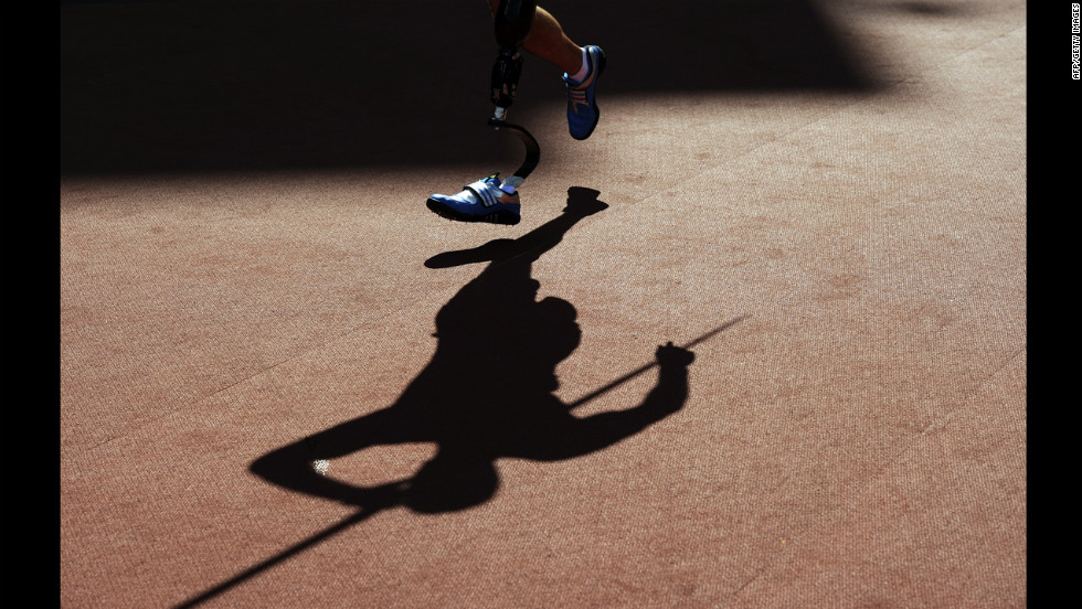A picture shows the shadow of competitors as they compete in the men&#39;s javelin throw F42 final on Friday, September 7. 