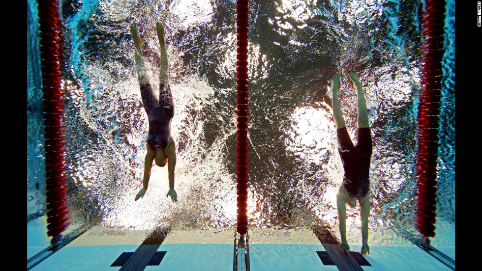 Sarah Rung, right, of Norway touches the wall ahead of Teresa Perales, left, of Spain to win gold in the women&#39;s 50m butterfly - S5 final on Friday.
