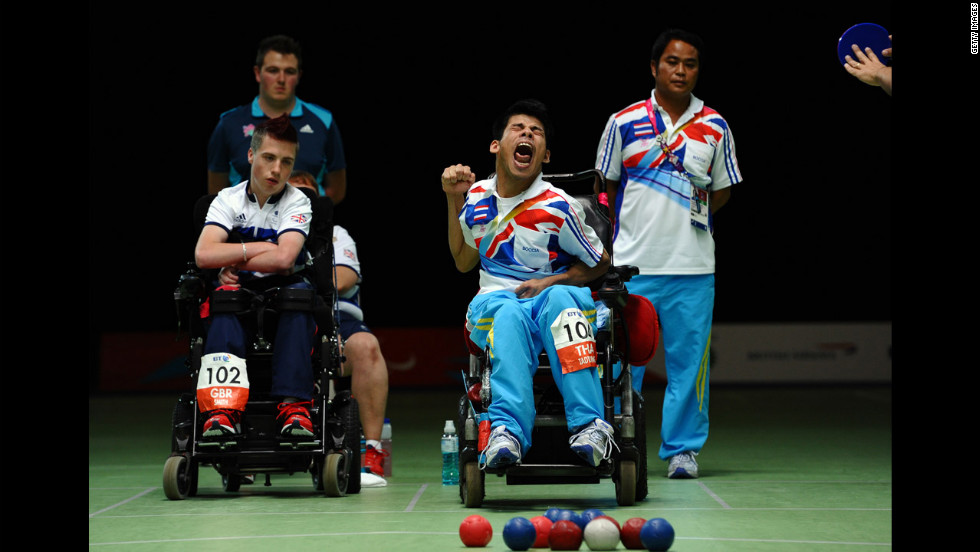 Thailand&#39;s Pattaya Tadtong, right, celebrates beating Britain&#39;s David Smith, left, in the final of the boccia individual BC1 competition on Saturday.