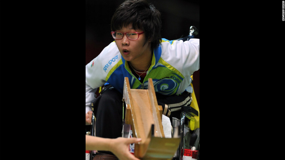 South Korea&#39;s Choi Ye-Jin watches her shot in the gold medal final of the boccia mixed individual BC3 competition against South Korea&#39;s Jeong Ho-won on Saturday.