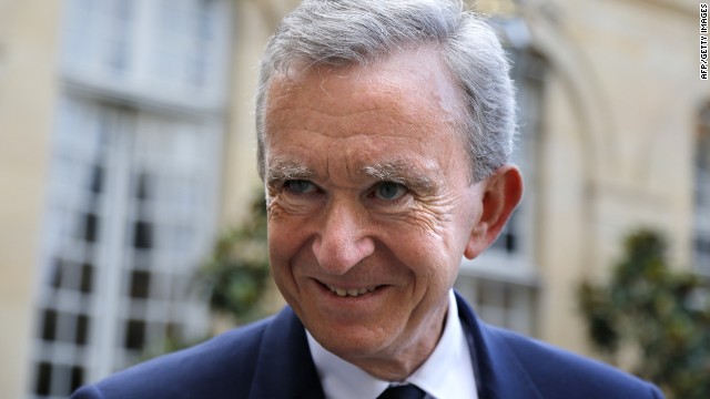 Bernard Arnault, France&#39;s richest man, says he will remain a tax resident of France despite a new 75% tax rate.