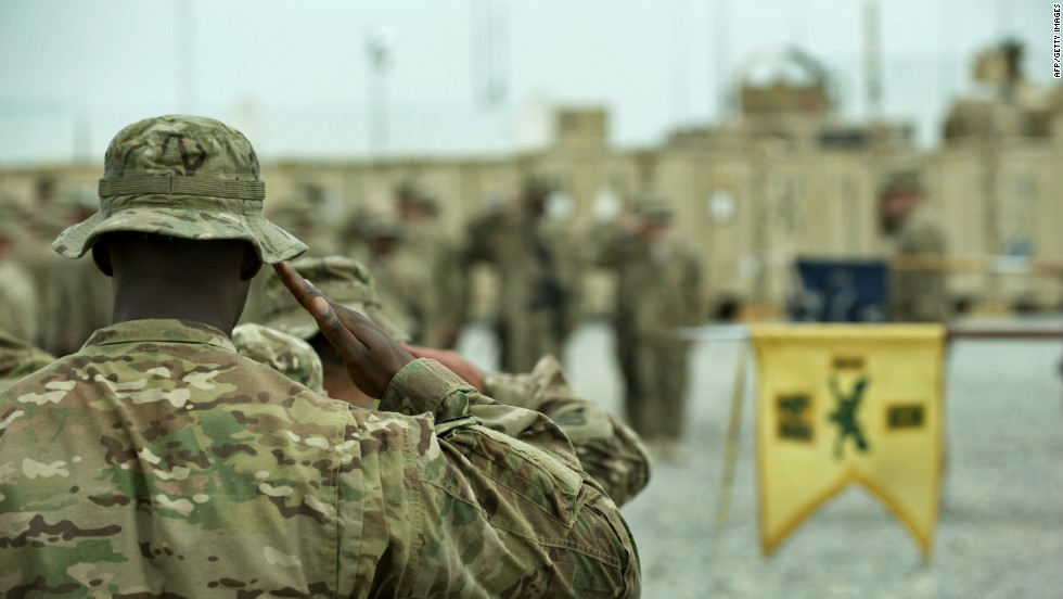 U.S. military platoons operating out of Lindsey-Forward Operating Base in Afghanistan stand in formation Tuesday during a brief ceremony.