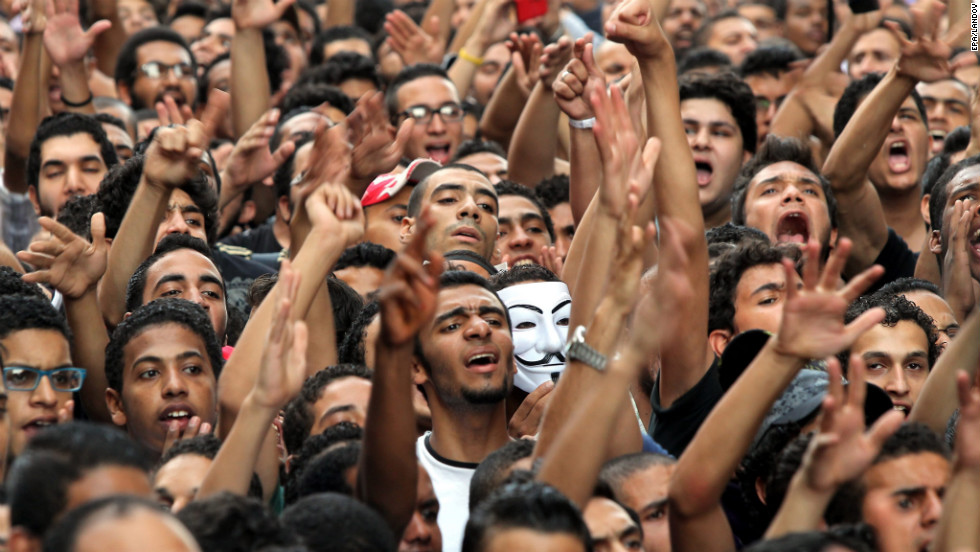 Demonstrators yell outside the U.S. Embassy.