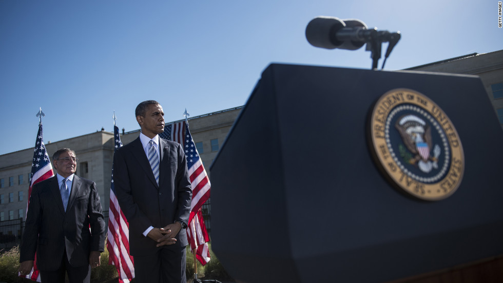 U.S. Defense Secretary Leon Panetta, left, and President Barack Obama stand during a memorial service at the Pentagon in Washington. Obama attended the memorial service, near where American Airlines flight 77 crashed into the Pentagon, to honor the victims of the September 11 attacks.