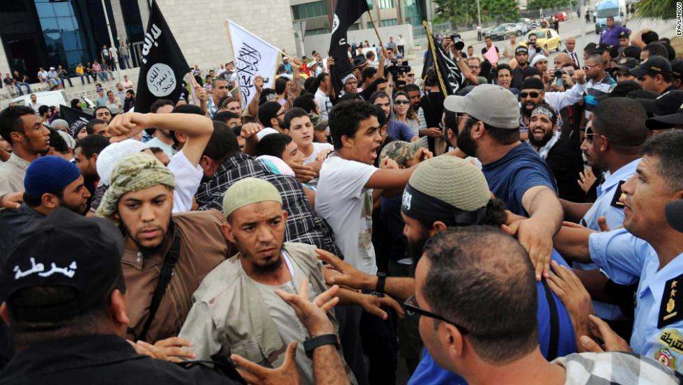 A group of protesters attend a demonstration outside the U.S. Embassy in Tunis on Wednesday.