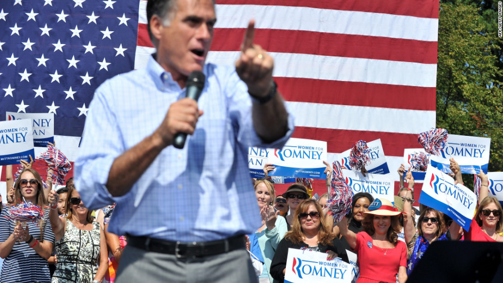 Supporters cheer as Romney speaks at a campaign rally in Fairfax, Virginia, on Thursday.