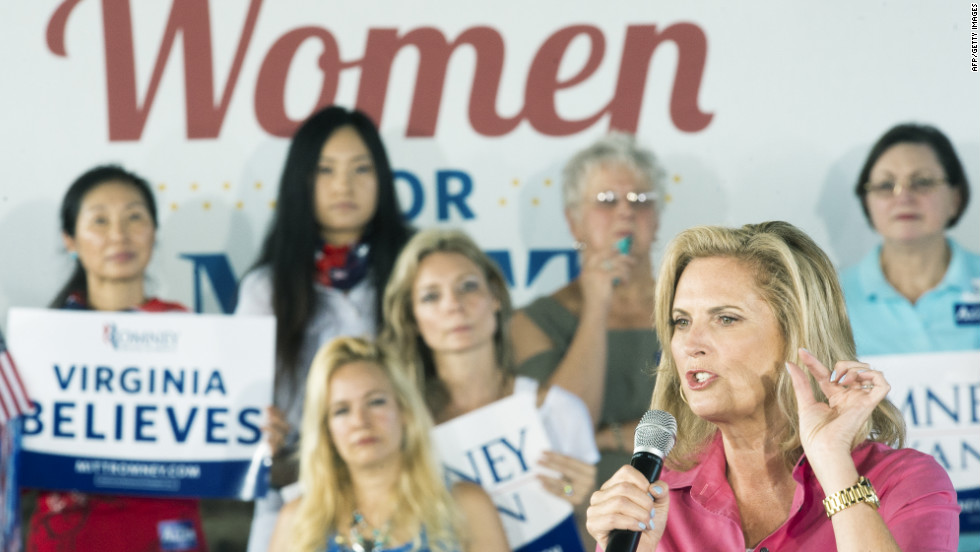 Ann Romney, wife of Republican presidential candidate Mitt Romney, waves to the crowd before speaking at a rally in Leesburg, Virginia, on Friday, September 7.