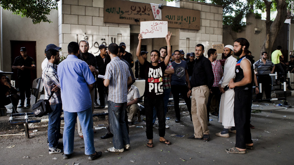 Egyptian protesters gather in front of the U.S. Embassy the morning after it was vandalized by protesters during a demonstration on Wednesday in Cairo.