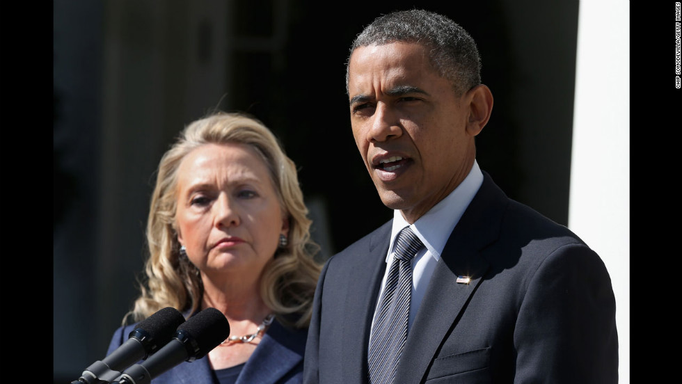 U.S. President Barack Obama, with Secretary of State Hillary Clinton on September 12, makes a statement at the White House about Stevens&#39; death.