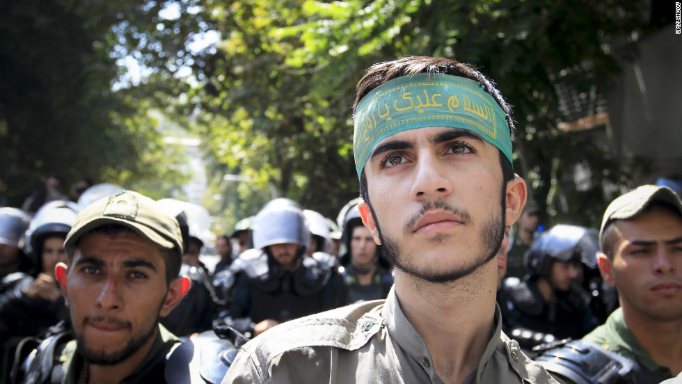 Iranian demonstrators chant anti-American slogans during a demonstration on Thursday in front of the Swiss Embassy, which serves as the U.S. interests section in Iran, in Tehran.