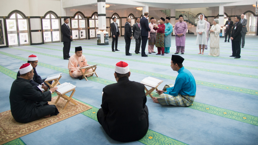 The royal couple visits Assyakirin Mosque in Kuala Lumpur, Malaysia, on Friday.