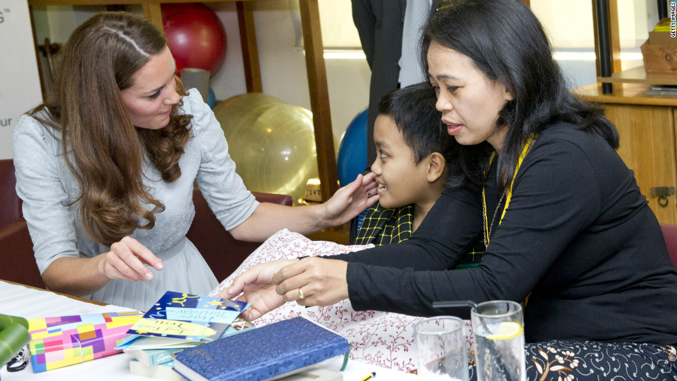 Catherine meets leukemia sufferer Zakwan Anuar, 15, at Hospis Malaysia on September 13, 2012.