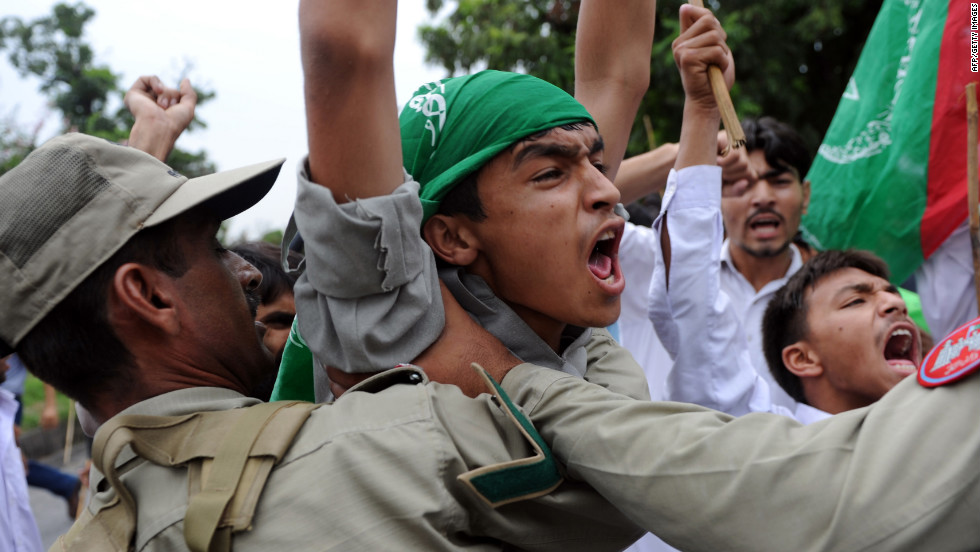 Muslim protesters shout outside the U.S. Embassy in Islamabad, Pakistan, on Friday.