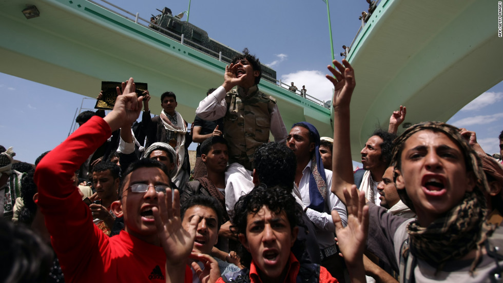 Yemeni protesters shout during a demonstration near the U.S. Embassy in Sanaa on Friday.