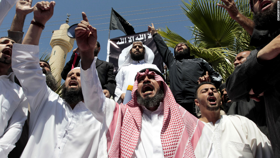 Jordanian protesters shout in Amman on Friday.