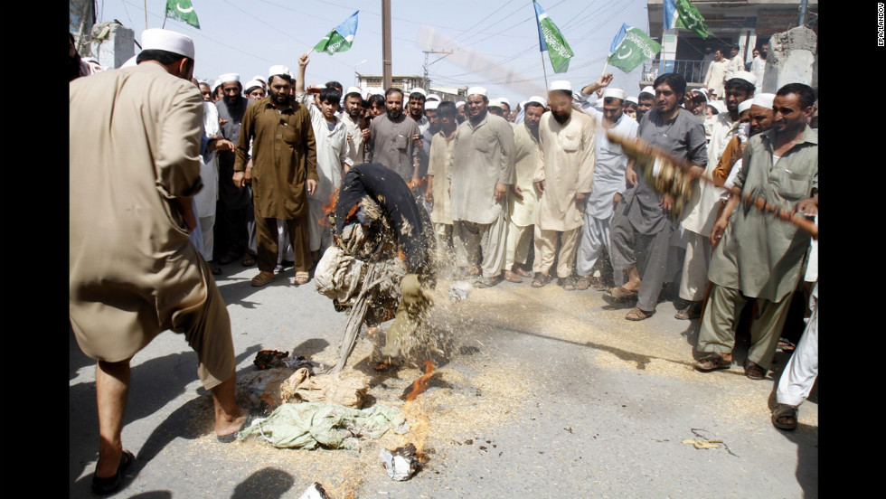 Supporters of Islamic political party Jamaat-e-Islami shout slogans during a protest on Saturday in Khyber Agency, Pakistan. The Pakistani parliament passed a resolution on Thursday condemning &quot;The Innocence of Muslims&quot; and urged the U.S. to take appropriate action. 