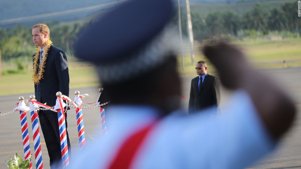 Prince William, Duke of Cambridge, inspects an honor guard as he arrives at Honiara International Airport in the Solomon Islands on Sunday, September 16.