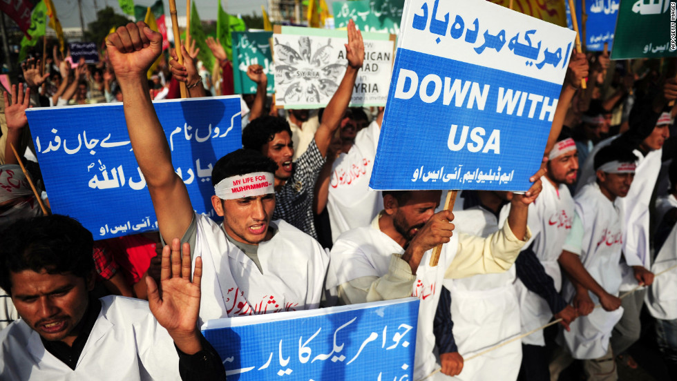 Pakistani protestors hold banners and shout anti-U.S. slogans in Karachi on Sunday.