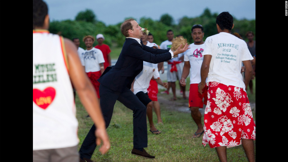 Prince William plays a local game called Te Ano on Tuesday, September 18, in Tuvalu. 