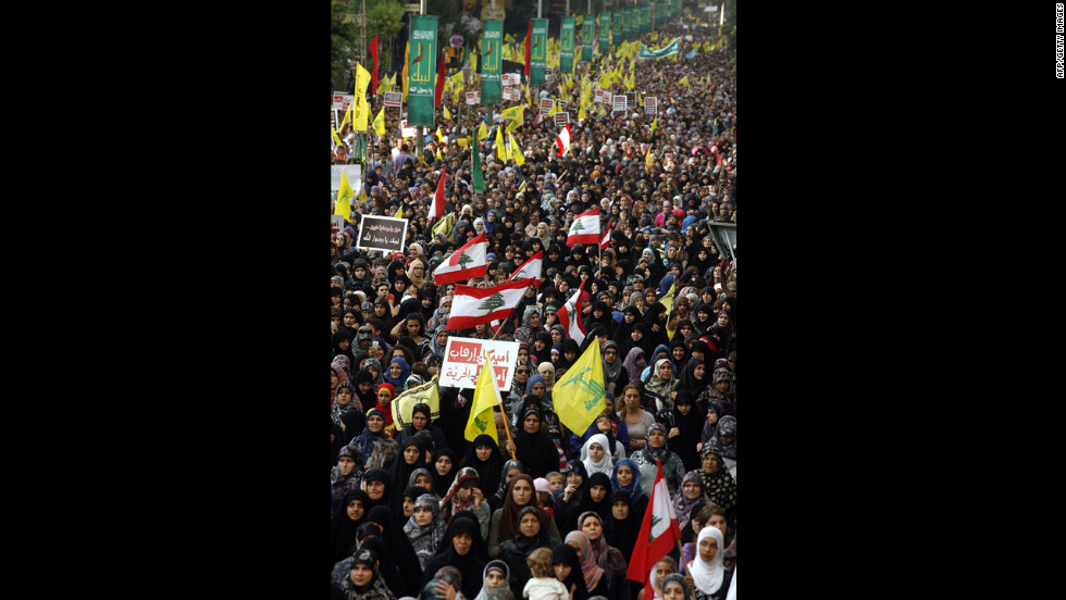 Supporters of Lebanon&#39;s Hezbollah group march during a rally in southern Beirut to denounce the film mocking Islam on Monday, September 17. Hezbollah chief Hassan Nasrallah, who made a rare public appearance at the rally, has called for a week of protests across the country over the film, describing it as the &quot;worst attack ever on Islam.&quot; 