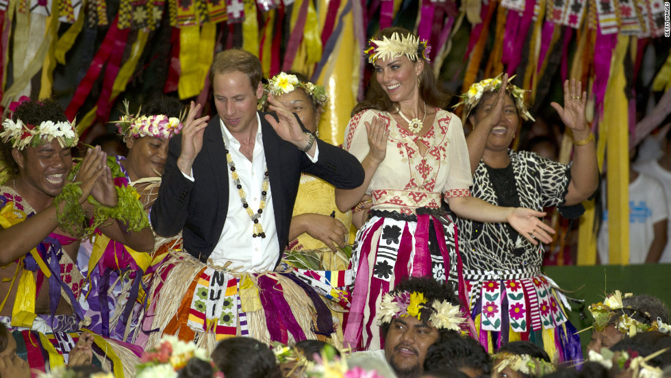 The duke and duchess dance with ladies at the Vaiku Falekaupule ceremony for an entertainment program on Tuesday in Tuvalu.