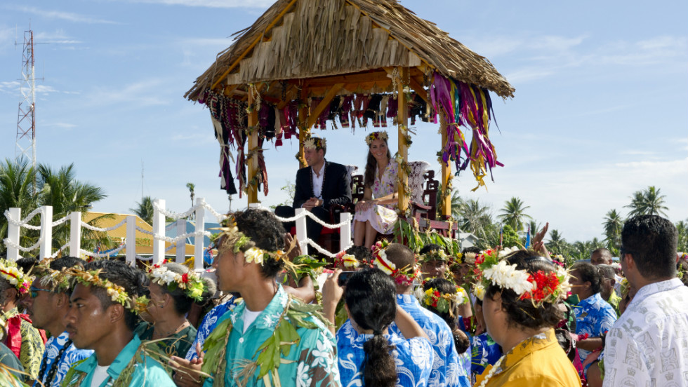 Prince William and Catherine, Duchess of Cambridge, are carried as they bid farewell in Tuvalu on Wednesday, September 19. The Duke and Duchess of Cambridge -- on a tour marking the diamond jubilee of Queen Elizabeth II -- are visiting Singapore, Malaysia, the Solomon Islands and Tuvalu. &lt;a href=&quot;http://www.cnn.com/SPECIALS/world/photography/index.html&quot; target=&quot;_blank&quot;&gt;See more of CNN&#39;s best photography&lt;/a&gt;.